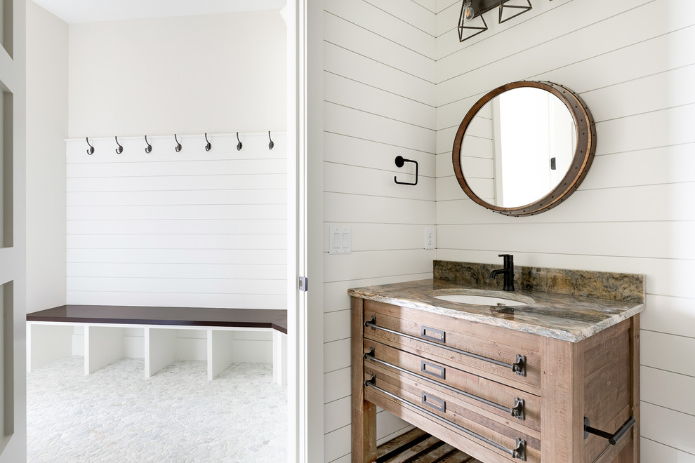 Medium sized rural shower room bathroom in Minneapolis with medium wood cabinets, pebble tile flooring, granite worktops, multi-coloured worktops, white walls, a two-piece toilet, shaker cabinets, a submerged sink and grey floors.
