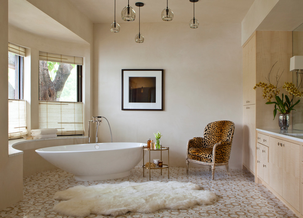 Example of a trendy freestanding bathtub design in Austin