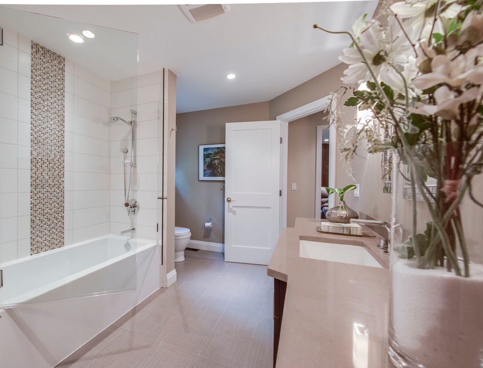 Design ideas for a small traditional shower room bathroom in Vancouver with recessed-panel cabinets, dark wood cabinets, an alcove shower, a one-piece toilet, beige tiles, mosaic tiles, beige walls, ceramic flooring, a submerged sink, engineered stone worktops, beige floors and a hinged door.