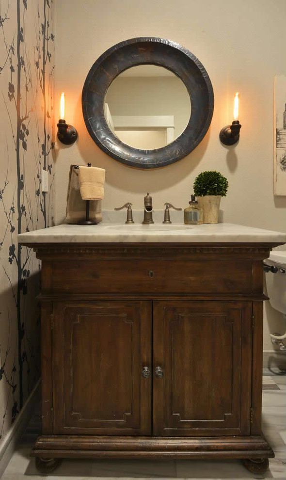 Mid-sized urban bathroom photo in Austin with a drop-in sink, raised-panel cabinets, dark wood cabinets, a one-piece toilet and beige walls
