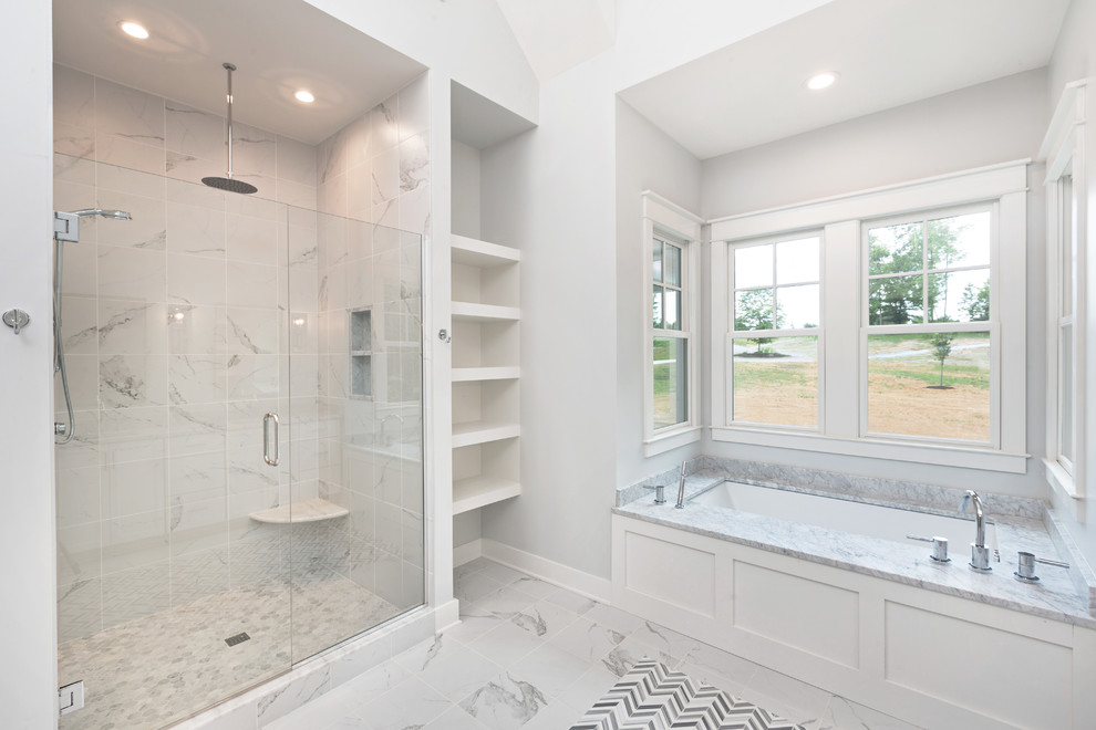 Inspiration for a huge transitional master white tile and porcelain tile porcelain tile and white floor doorless shower remodel in Louisville with shaker cabinets, white cabinets, an undermount tub, a two-piece toilet, white walls, an undermount sink, marble countertops and a hinged shower door