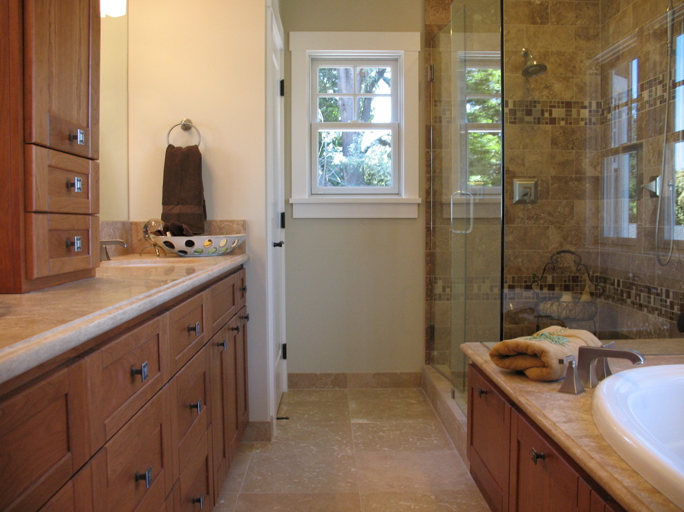 Inspiration for a medium sized classic bathroom in San Francisco with a submerged sink, shaker cabinets, medium wood cabinets, granite worktops, a built-in bath, a corner shower, brown tiles, stone tiles, grey walls and travertine flooring.