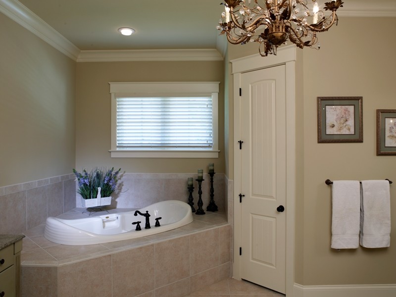 Example of an arts and crafts bathroom design in Charlotte
