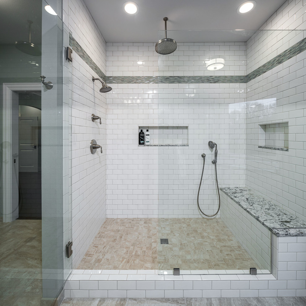 Large arts and crafts master white tile and ceramic tile ceramic tile and multicolored floor alcove shower photo in Other with a hinged shower door