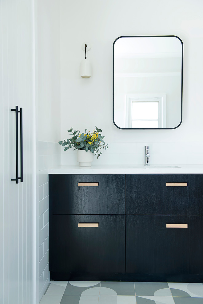 This is an example of a large contemporary family bathroom in Perth with black cabinets, a built-in bath, a walk-in shower, white tiles, ceramic tiles, white walls, ceramic flooring, a submerged sink, engineered stone worktops and an open shower.