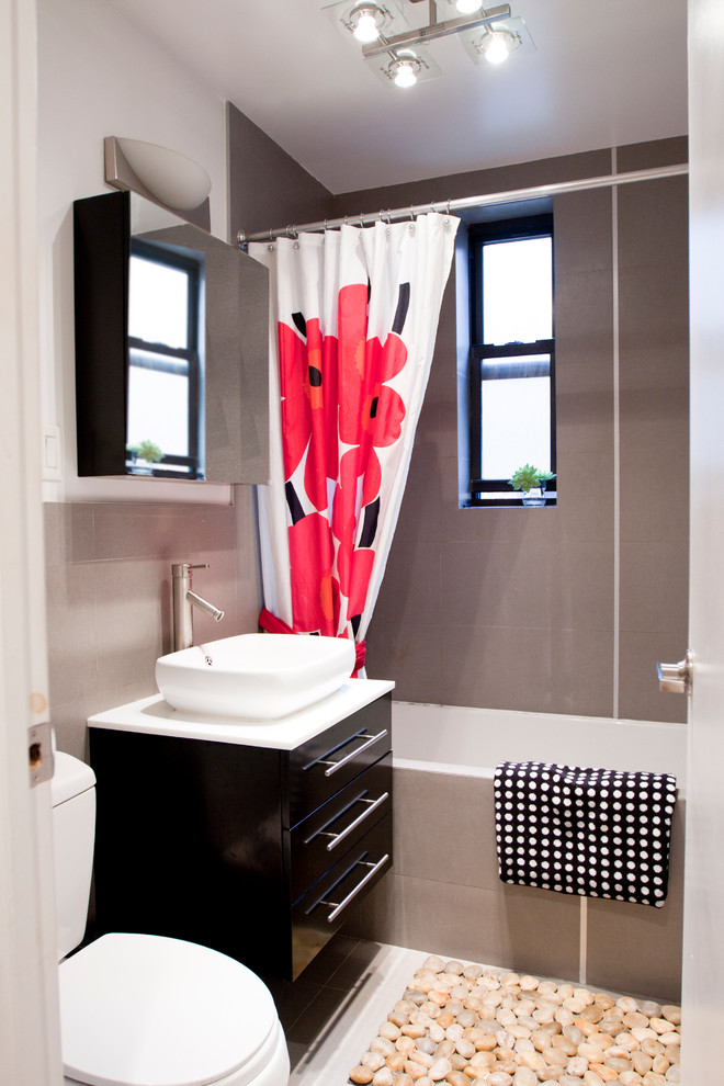 Example of a trendy bathroom design in New York with a vessel sink