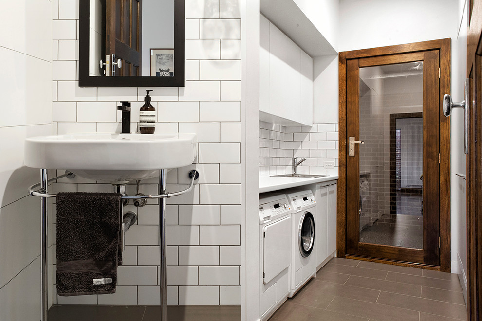 Design ideas for an urban bathroom in Melbourne with a laundry area.