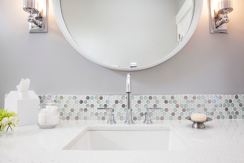 Medium sized classic shower room bathroom in San Francisco with shaker cabinets, white cabinets, engineered stone worktops, a submerged sink, porcelain flooring, an alcove bath, a shower/bath combination, a one-piece toilet, multi-coloured tiles, mosaic tiles and grey walls.