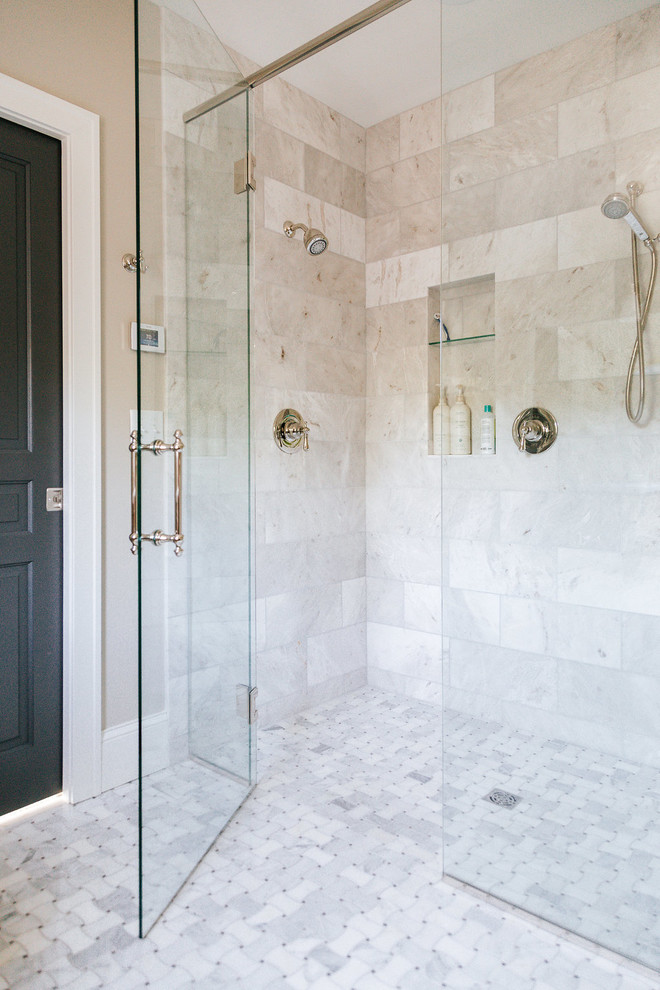 Inspiration for a medium sized traditional ensuite bathroom in Minneapolis with shaker cabinets, medium wood cabinets, an alcove shower, grey tiles, marble tiles, a submerged sink, marble worktops and a hinged door.