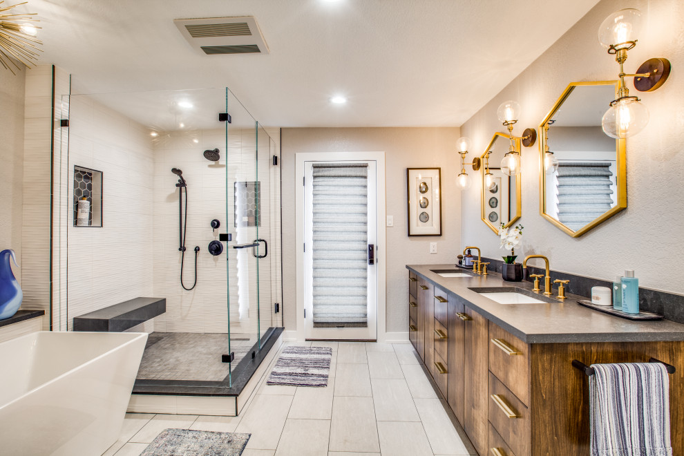 Inspiration for a mid-sized transitional master gray tile and ceramic tile porcelain tile and white floor bathroom remodel in Other with flat-panel cabinets, medium tone wood cabinets, a two-piece toilet, gray walls, an undermount sink, quartz countertops, a hinged shower door and gray countertops