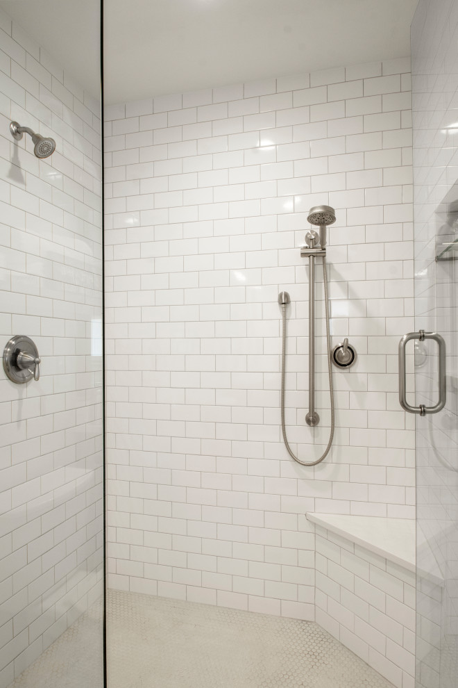 Double shower - mid-sized transitional kids' white tile and ceramic tile porcelain tile and multicolored floor double shower idea in Dallas with flat-panel cabinets, brown cabinets, a two-piece toilet, white walls, an undermount sink, quartz countertops, a hinged shower door and white countertops