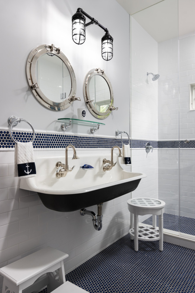 Example of a beach style white tile and subway tile mosaic tile floor, blue floor and double-sink bathroom design in Other with gray walls and a wall-mount sink