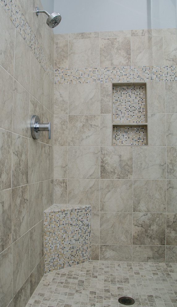 Example of a mid-sized transitional master beige tile and ceramic tile porcelain tile and brown floor bathroom design in DC Metro with an undermount sink, shaker cabinets, dark wood cabinets, granite countertops, a two-piece toilet, blue walls and a hinged shower door