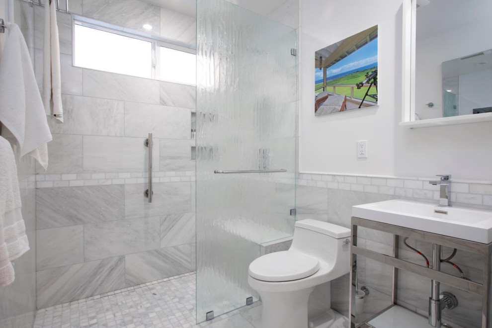 This is an example of a small contemporary bathroom in Los Angeles with a walk-in shower, a one-piece toilet, white tiles, marble tiles, white walls, marble flooring, a submerged sink, engineered stone worktops, white floors, an open shower and white worktops.