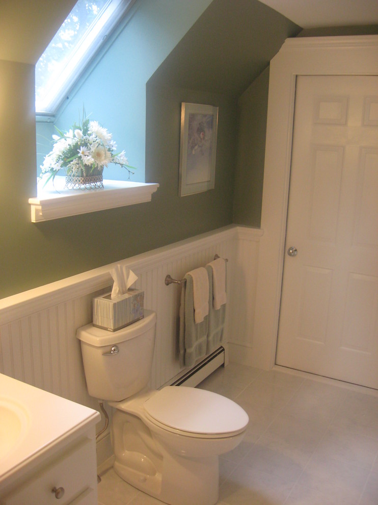 Large arts and crafts master white tile ceramic tile bathroom photo in Portland Maine with an integrated sink, recessed-panel cabinets, white cabinets, a two-piece toilet and green walls