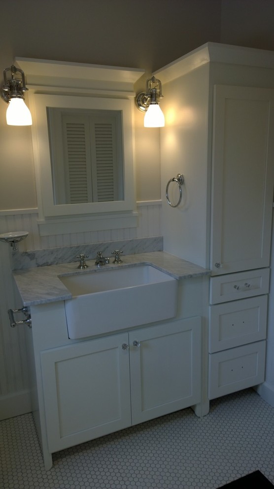 This is an example of a medium sized country shower room bathroom in Indianapolis with shaker cabinets, white cabinets, grey walls, mosaic tile flooring, a submerged sink, limestone worktops and white floors.