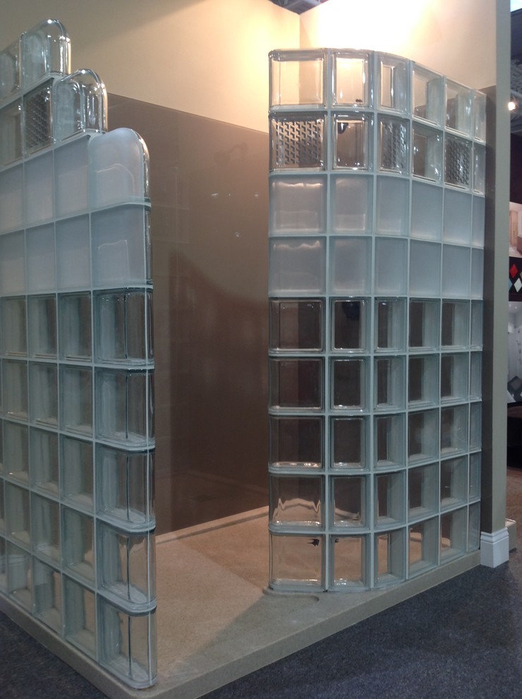 Curved glass block shower with solid surface base Modern Bathroom