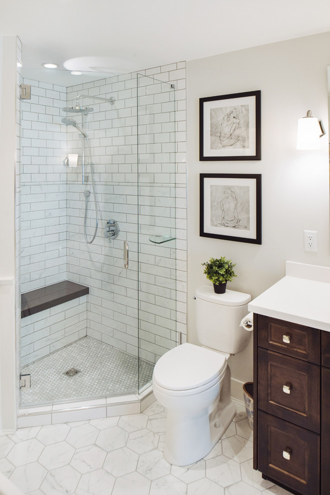 Mid-sized farmhouse master white tile and porcelain tile porcelain tile and gray floor bathroom photo in Vancouver with shaker cabinets, dark wood cabinets, a two-piece toilet, white walls, an undermount sink, quartz countertops and a hinged shower door