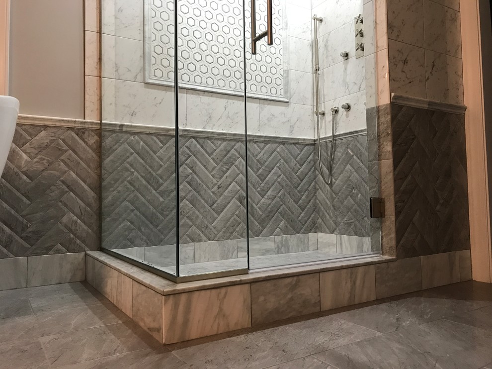 Large traditional ensuite bathroom in Other with a freestanding bath, a corner shower, grey tiles, white tiles, metro tiles, grey walls, porcelain flooring, grey floors and a hinged door.