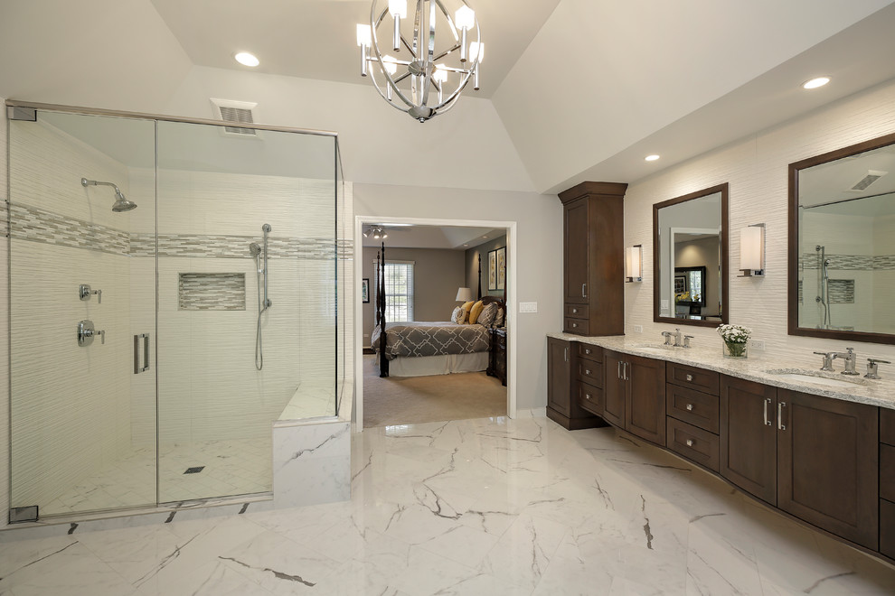 Large transitional master porcelain tile bathroom photo in Chicago with shaker cabinets, dark wood cabinets, gray walls, an undermount sink, granite countertops and a hinged shower door