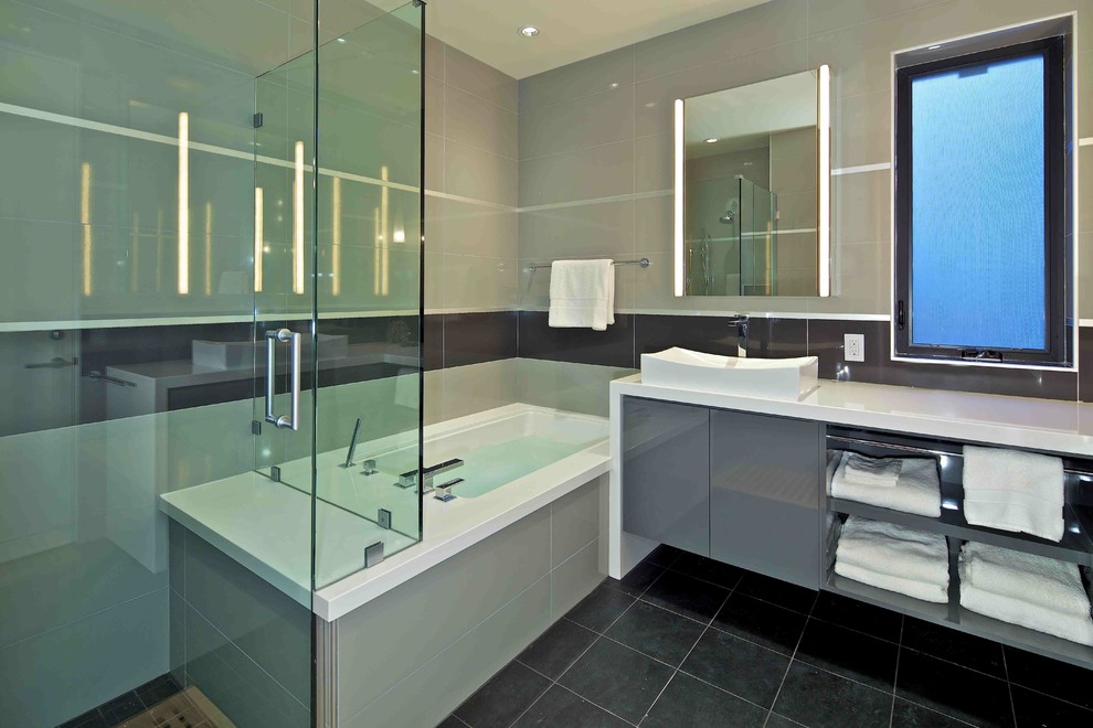 This is an example of a contemporary bathroom in San Diego with a vessel sink.