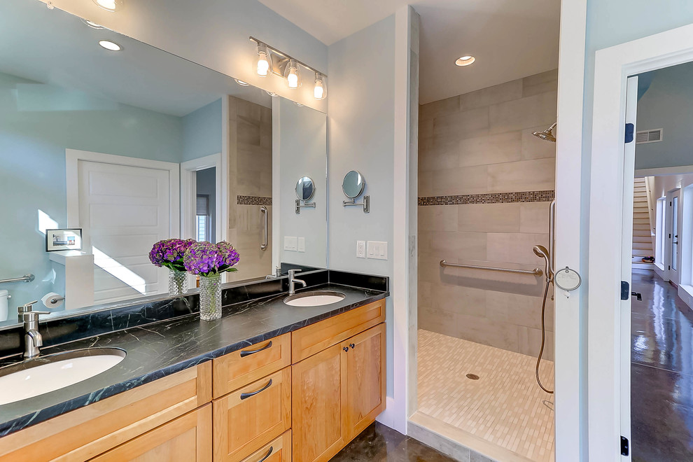 Bathroom - mid-sized transitional master concrete floor and brown floor bathroom idea in Charleston with medium tone wood cabinets, blue walls, an undermount sink and soapstone countertops