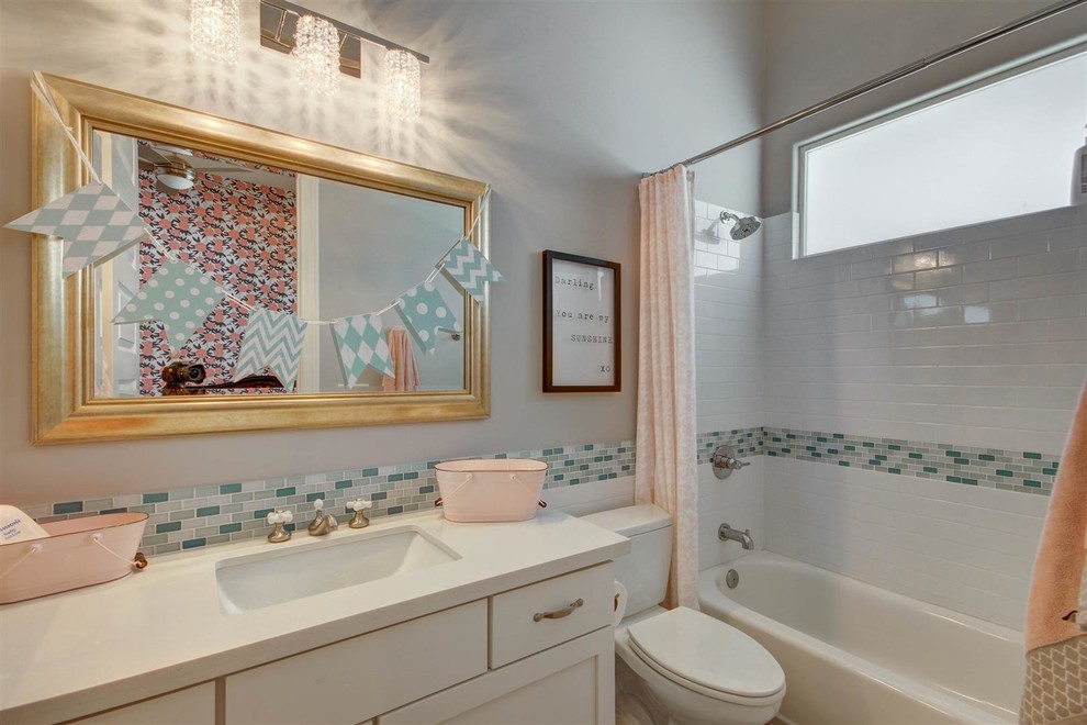 This is an example of a small traditional bathroom in Phoenix with grey walls.
