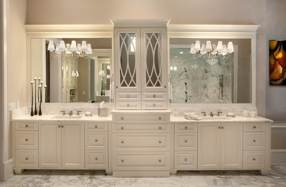 Freestanding bathtub - huge traditional white tile marble floor freestanding bathtub idea in Orlando with an integrated sink, white cabinets, marble countertops, gray walls and recessed-panel cabinets