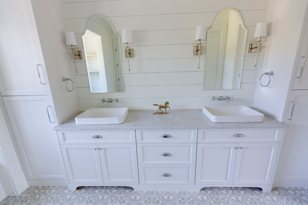 Medium sized classic ensuite bathroom in Atlanta with shaker cabinets, white cabinets, a built-in bath, a corner shower, white tiles, metro tiles, white walls, cement flooring, a built-in sink, granite worktops, grey floors and a hinged door.