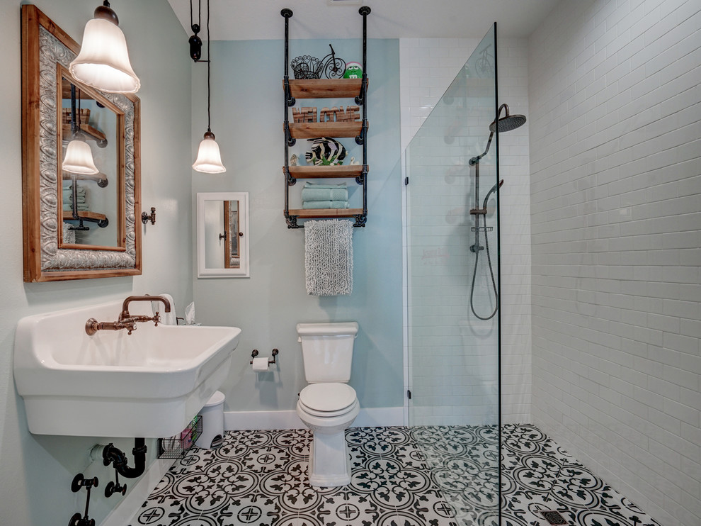 Design ideas for a medium sized coastal ensuite bathroom in Tampa with shaker cabinets, grey cabinets, a claw-foot bath, a walk-in shower, a two-piece toilet, white tiles, ceramic tiles, white walls, ceramic flooring, a pedestal sink and an open shower.