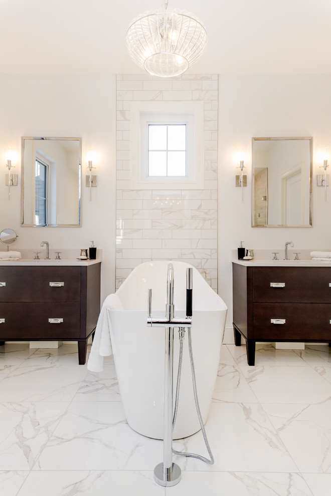 Design ideas for a small classic family bathroom in Other with flat-panel cabinets, medium wood cabinets, a freestanding bath, white tiles, marble tiles, white walls, marble flooring, a submerged sink, quartz worktops and white floors.