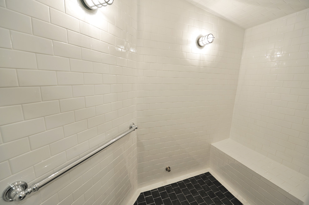This is an example of a bathroom in Raleigh with metro tiles and white walls.