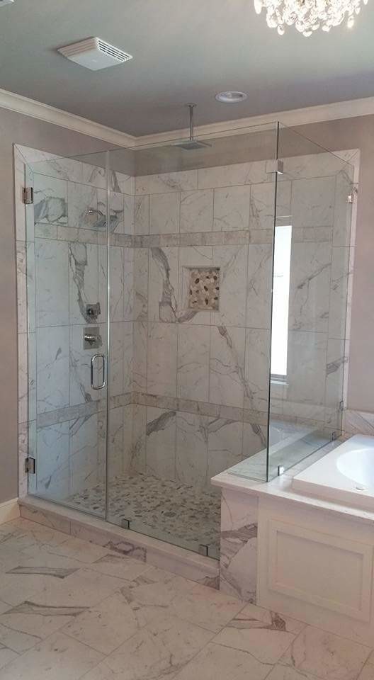 Photo of a medium sized traditional ensuite bathroom in Other with shaker cabinets, white cabinets, a built-in bath, an alcove shower, grey tiles, white tiles, marble tiles, grey walls, marble flooring and marble worktops.