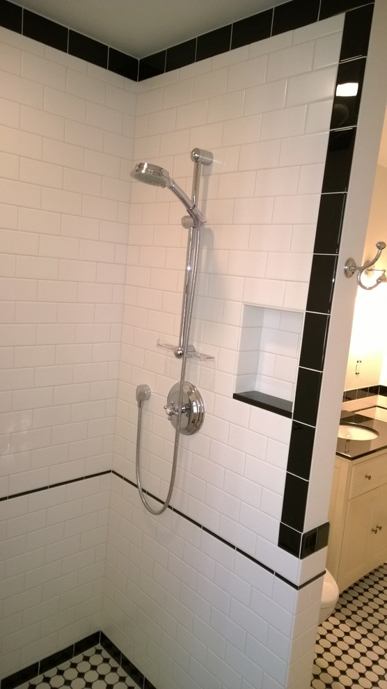 Example of a classic kids' white tile and ceramic tile ceramic tile doorless shower design in Burlington with an undermount sink, shaker cabinets, white cabinets, quartzite countertops and white walls