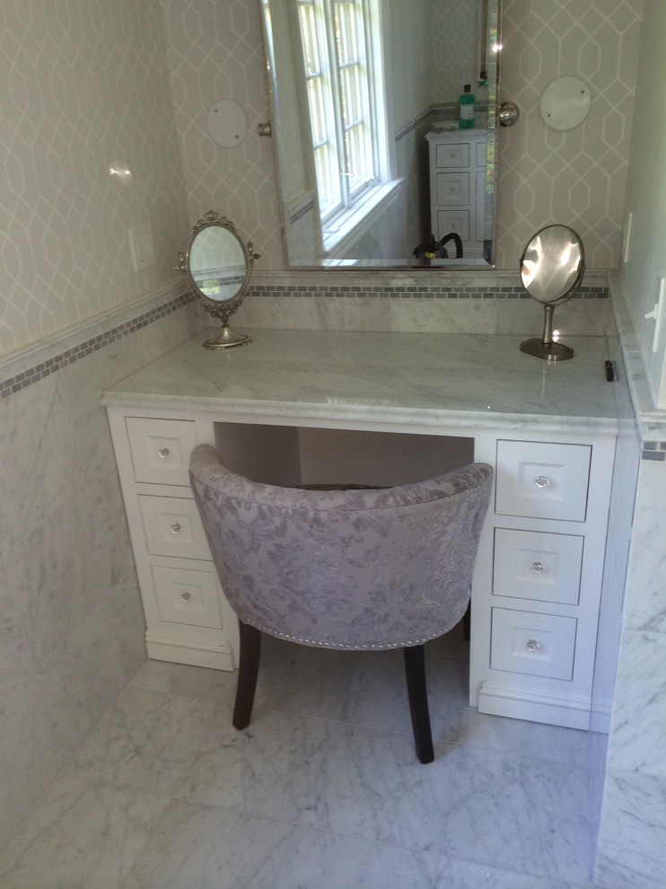 Large transitional master white tile and stone tile travertine floor bathroom photo in New York with an undermount sink, recessed-panel cabinets, white cabinets, marble countertops, a two-piece toilet and beige walls