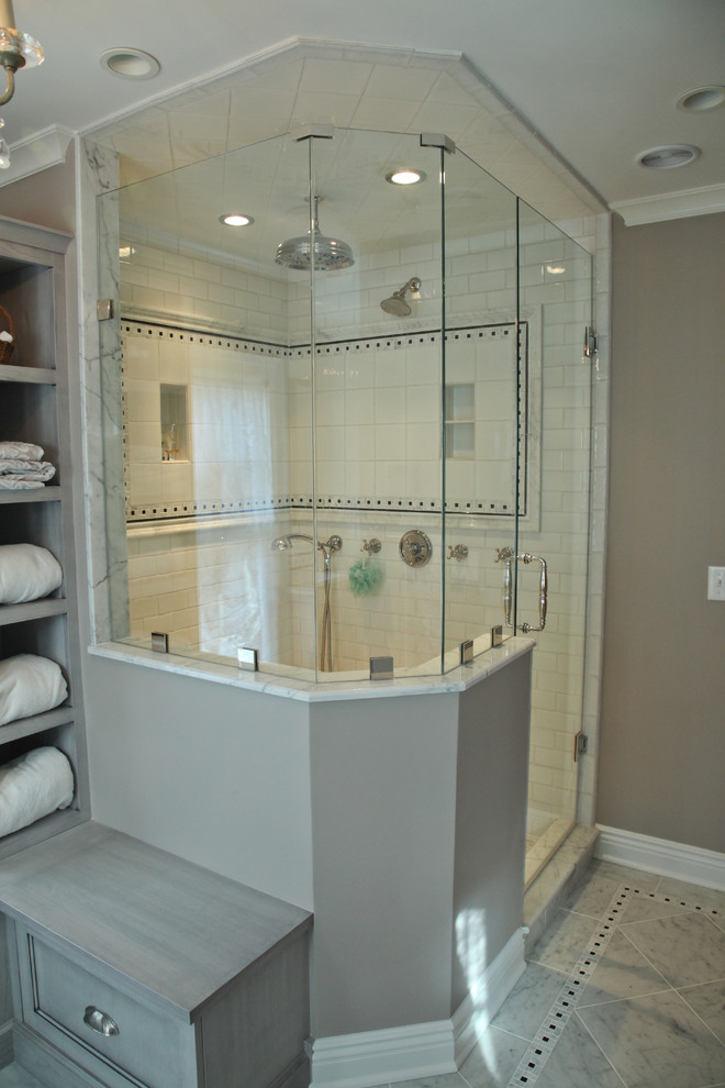 Custom vanity and shower area with unique tile pattern layour