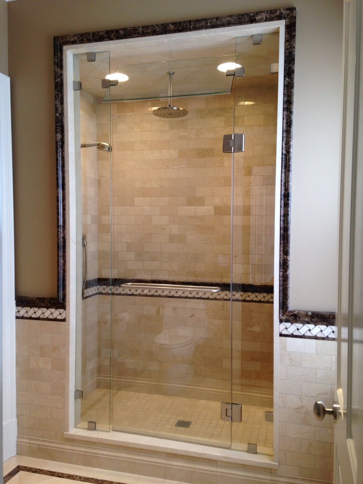 This is an example of a traditional sauna bathroom in Boston with beige tiles, stone tiles, beige walls and marble flooring.
