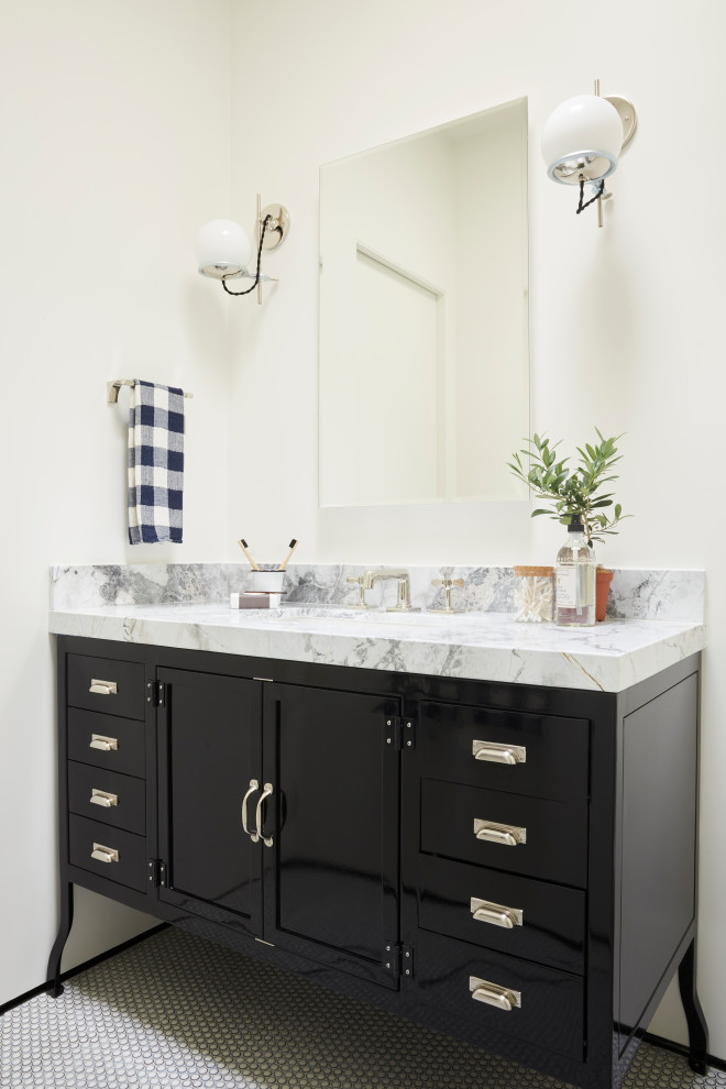 Example of a mid-sized transitional kids' white tile ceramic tile alcove shower design in San Francisco with black cabinets, white walls, an undermount sink, quartzite countertops, a hinged shower door and shaker cabinets