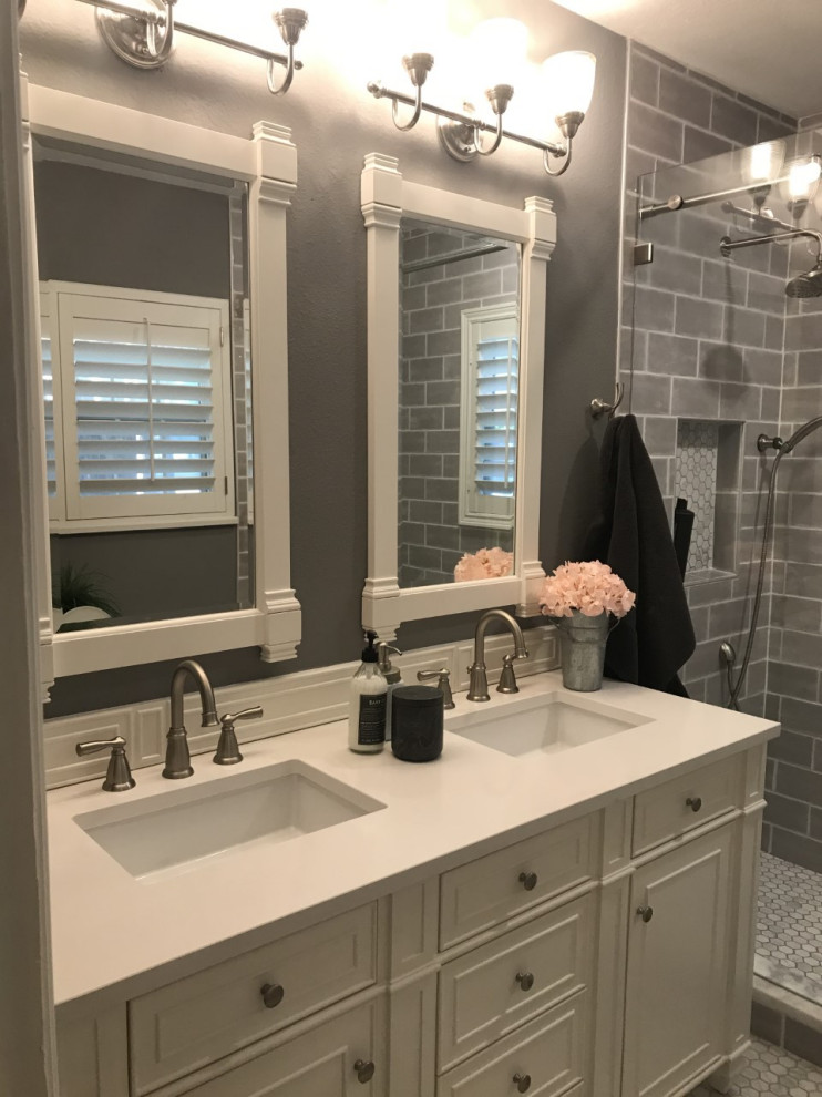Inspiration for a small timeless master gray tile and ceramic tile porcelain tile and white floor bathroom remodel in Austin with furniture-like cabinets, white cabinets, a two-piece toilet, gray walls, an undermount sink, quartz countertops and white countertops
