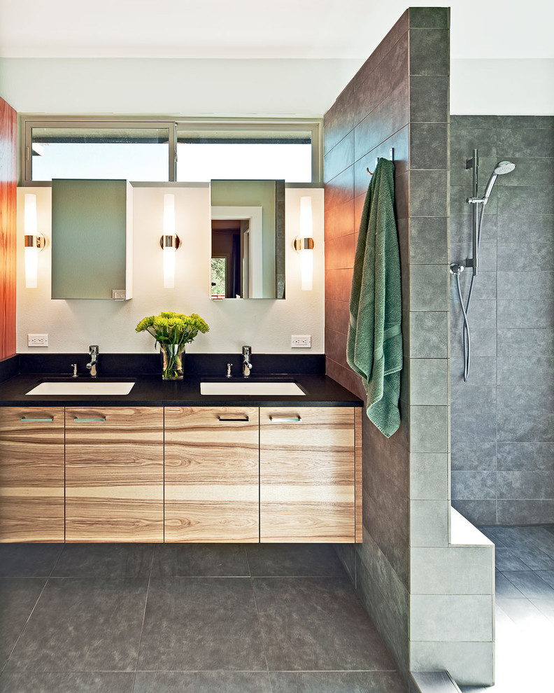 Contemporary bathroom in Austin with a walk-in shower, an open shower and feature lighting.