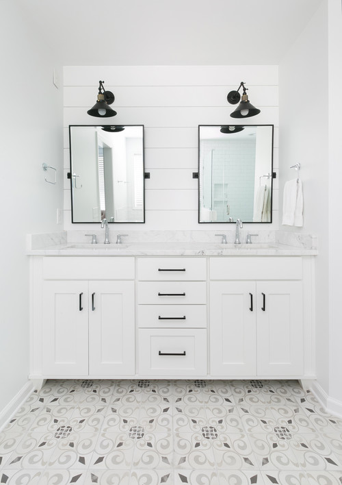 - mid-sized cottage master white tile and ceramic tile cement tile floor and gray floor freestanding bathtub idea in Charleston with white cabinets, white walls, an undermount sink and a hinged shower door 