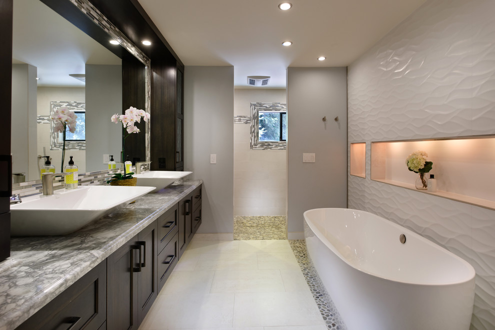 Bathroom - huge contemporary master white tile porcelain tile bathroom idea in San Francisco with a vessel sink, flat-panel cabinets, brown cabinets, quartzite countertops and white walls