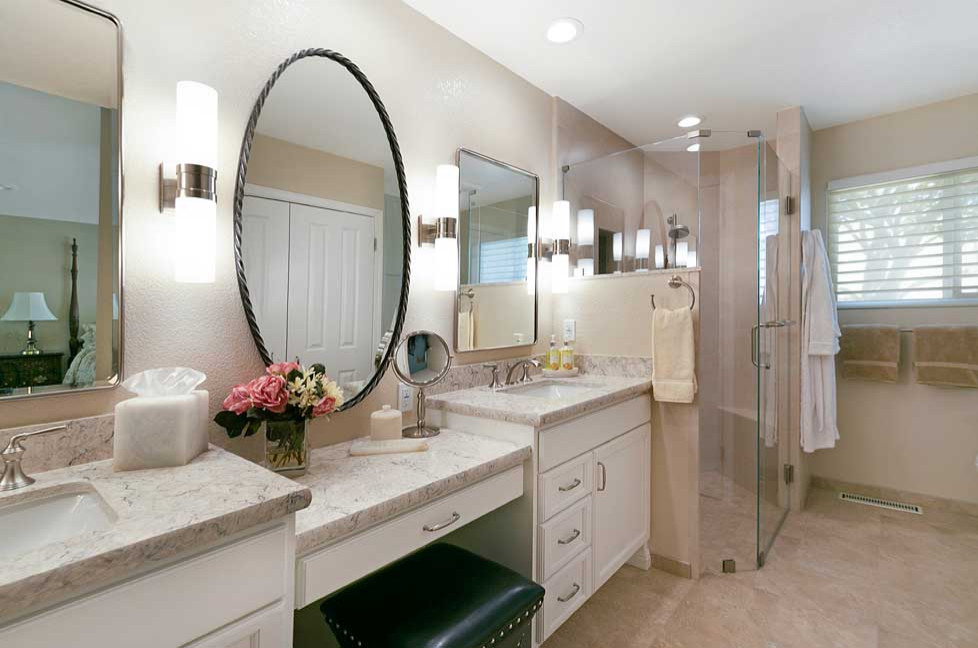 Example of a large transitional master beige tile and porcelain tile porcelain tile, beige floor and double-sink bathroom design in San Francisco with recessed-panel cabinets, white cabinets, a two-piece toilet, beige walls, an undermount sink, quartz countertops, a hinged shower door, beige countertops and a built-in vanity