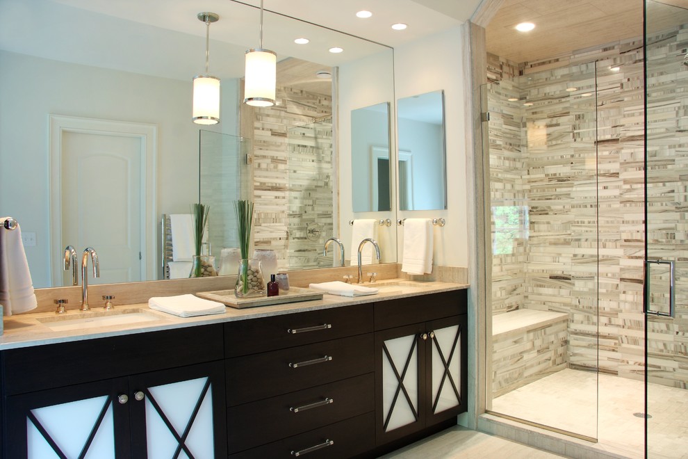 Mid-sized trendy master beige tile and stone tile porcelain tile and beige floor alcove shower photo in New York with glass-front cabinets, dark wood cabinets, white walls, an undermount sink, granite countertops, a hinged shower door and beige countertops