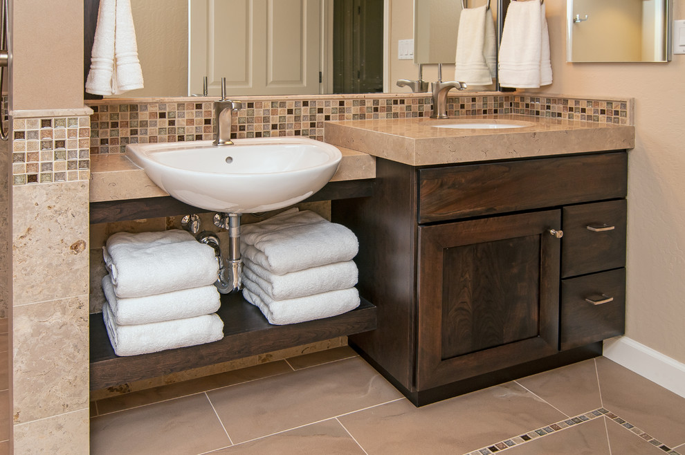 Example of a classic bathroom design in San Francisco with dark wood cabinets and a drop-in sink