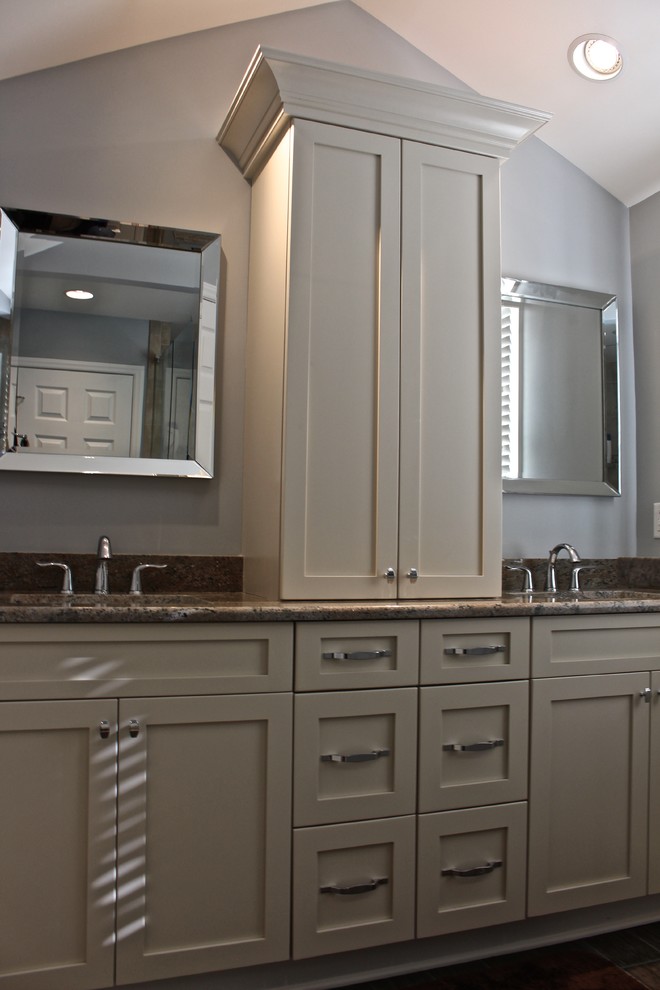 Inspiration for a small timeless master white tile and porcelain tile porcelain tile corner shower remodel in Raleigh with an undermount sink, shaker cabinets, white cabinets, granite countertops, a two-piece toilet and gray walls