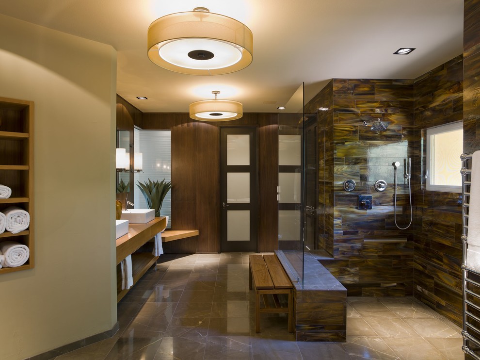 Inspiration for a contemporary bathroom remodel in Austin with a vessel sink