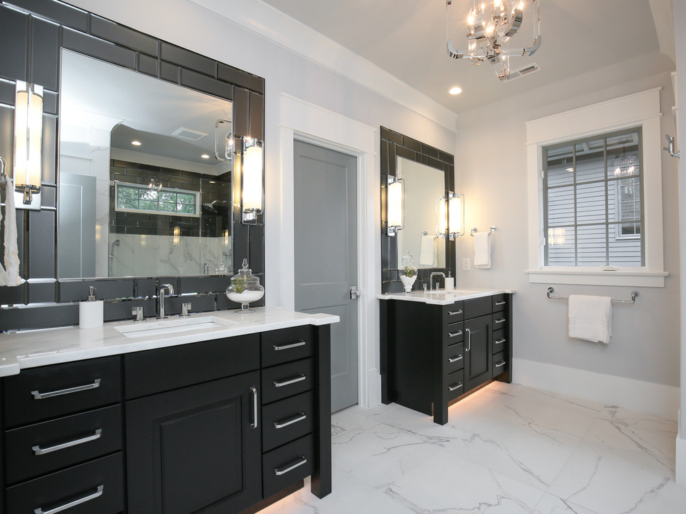 Example of a large transitional master porcelain tile and white floor bathroom design in Raleigh with raised-panel cabinets, black cabinets, gray walls, marble countertops and white countertops