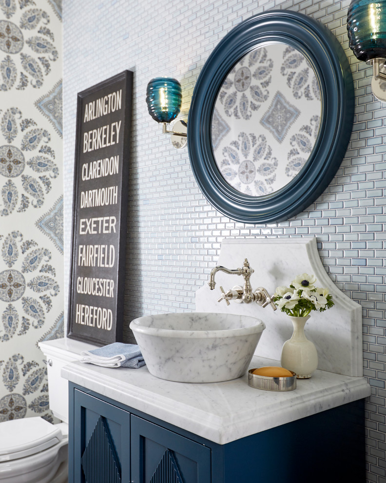 Example of a classic blue tile and mosaic tile bathroom design in Boston with blue cabinets, multicolored walls and a vessel sink
