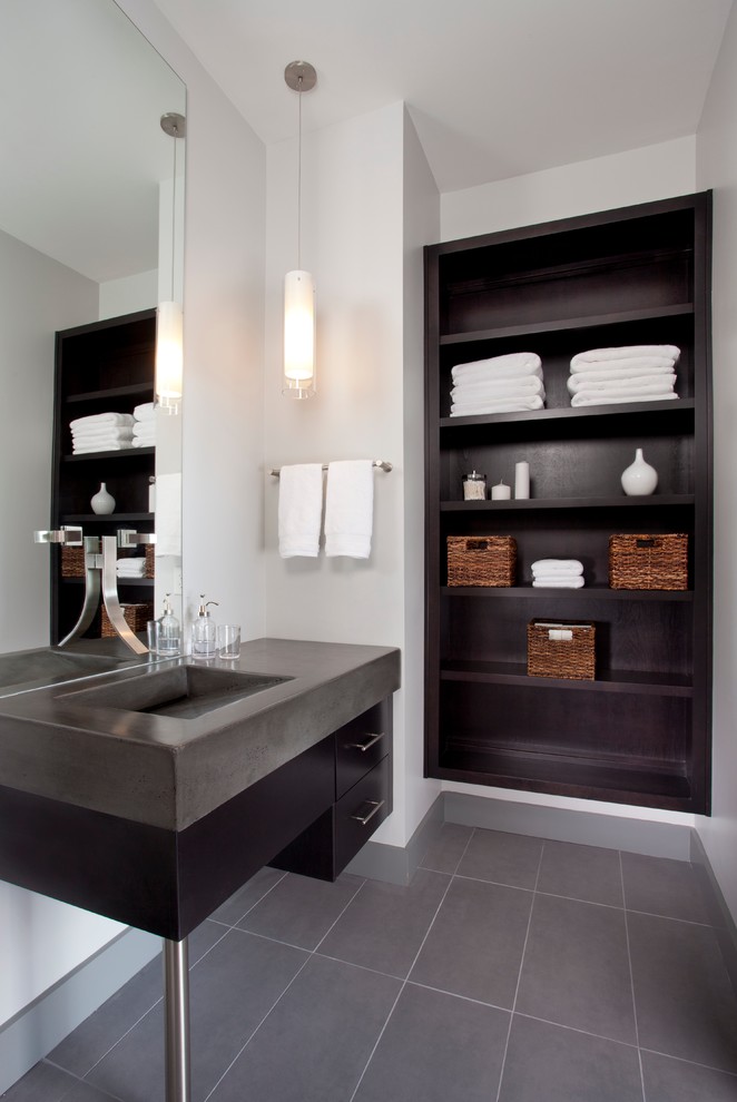 Идея дизайна: ванная комната в современном стиле с столешницей из бетона